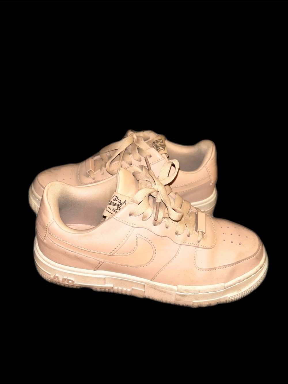 Nike Low-Top Sneakers in Pale Pink